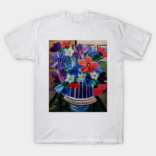 A beautiful bouquet flowers in a glass and gold vase . T-Shirt